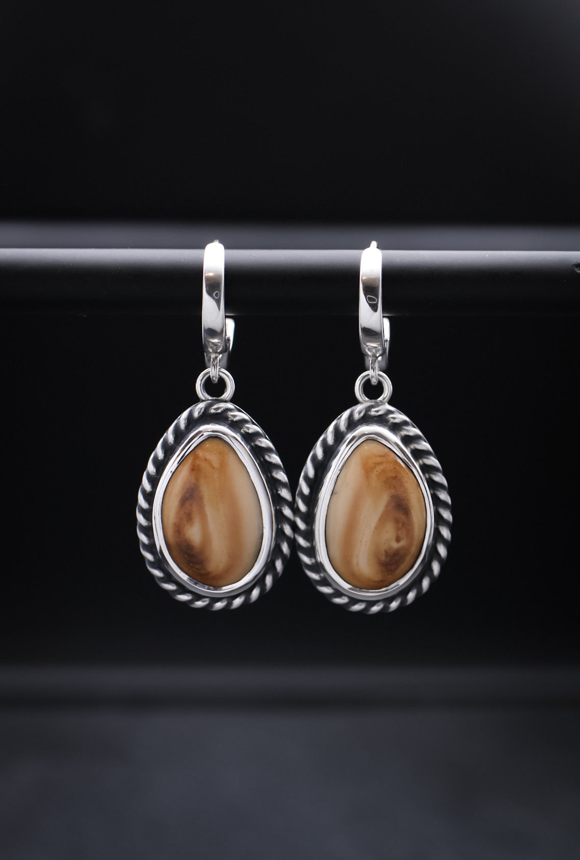 Elk Ivory Dangles • Rope Border