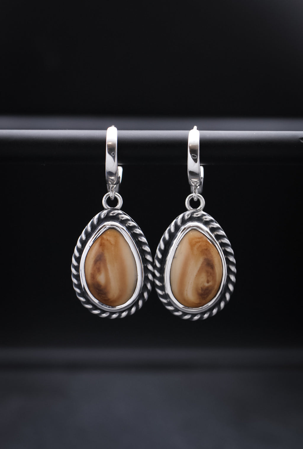 Elk Ivory Dangles • Rope Border